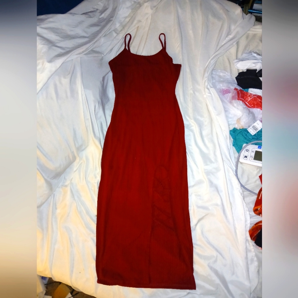 Maroon dress with cross cut in left leg. Everyone loved it when I wore it.